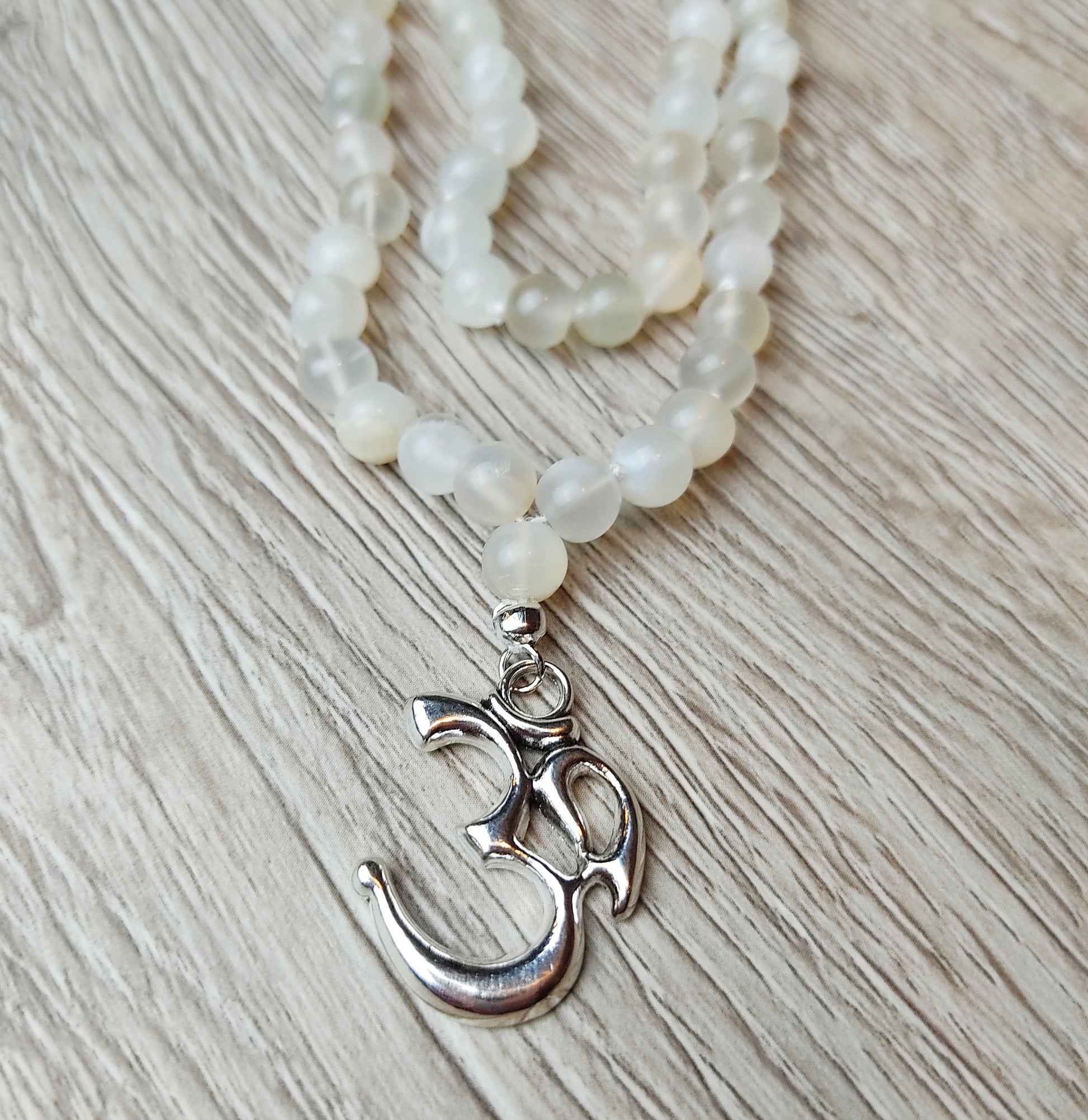 silver om moonstone beaded mala necklace