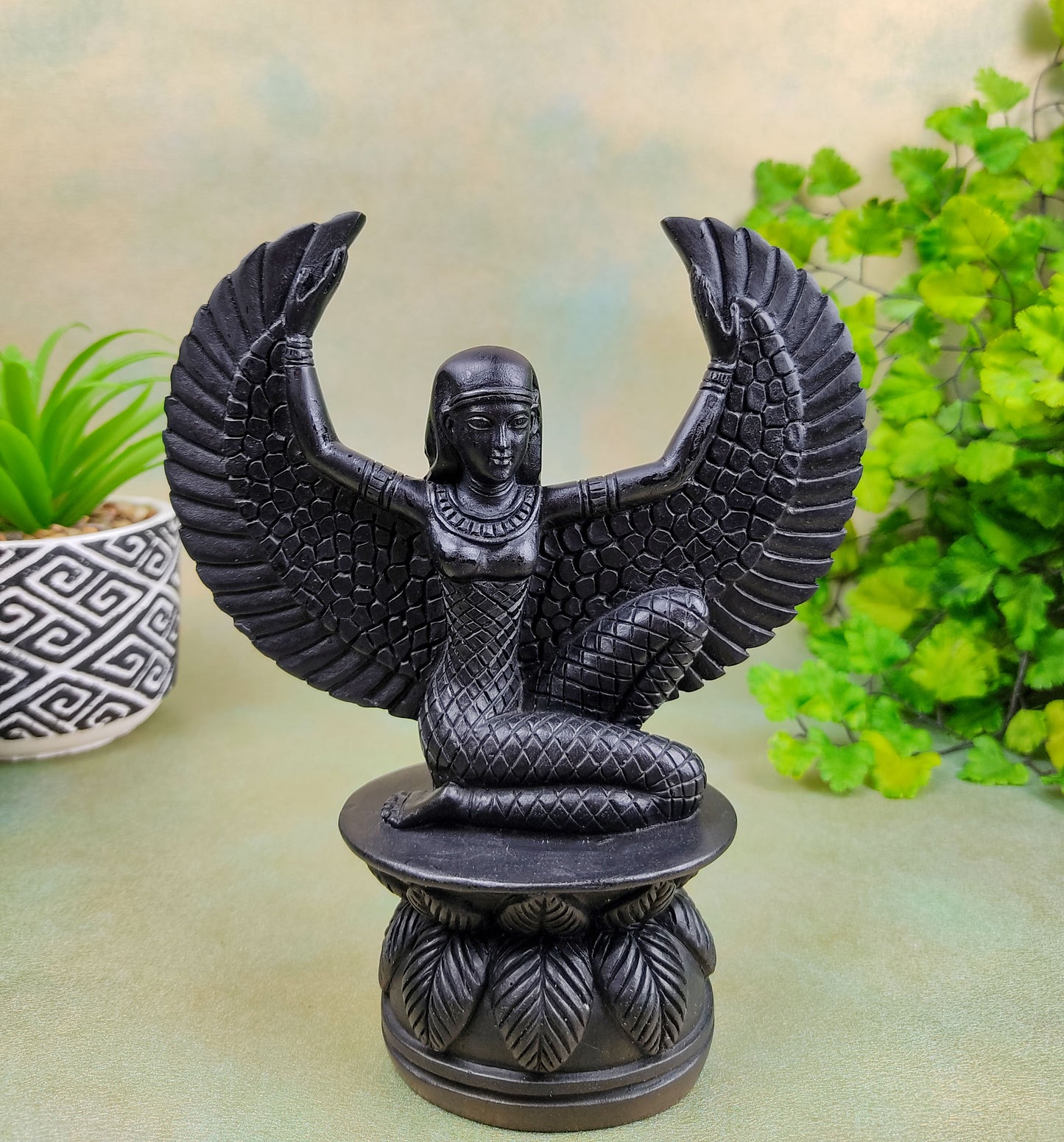 black winged isis goddess statue